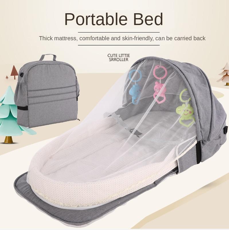 Foldable baby bed outlet with mosquito net